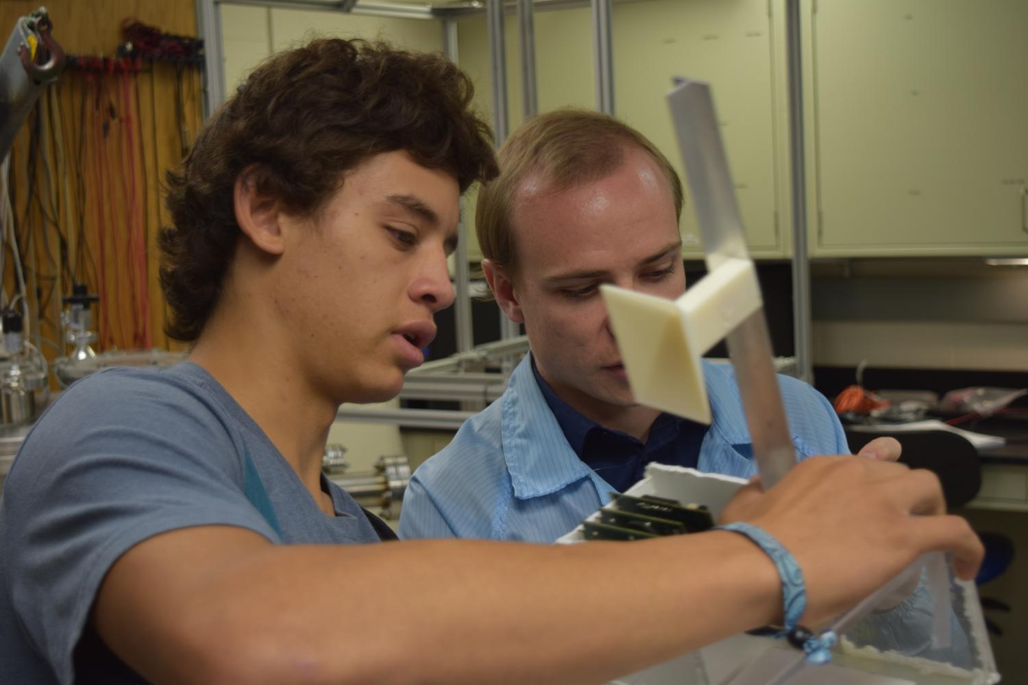 Andrew Dahir with one of the students.