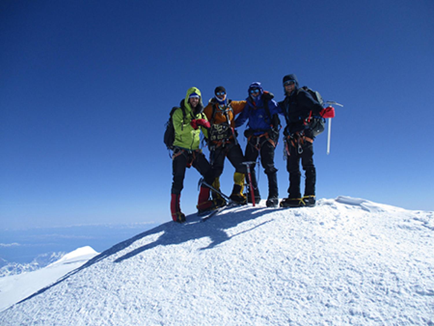 The Colorado Buffaloes atop snowy Denali.