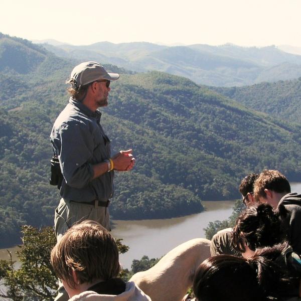 Teacher and students learning in the rainforest