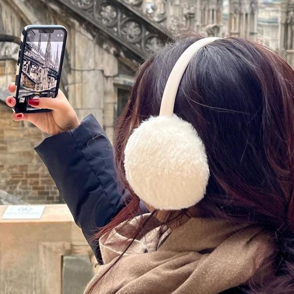 Student taking photo at Milan's duomo