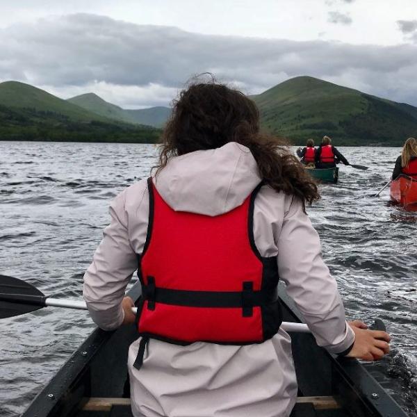 Student canoeing in Scotland