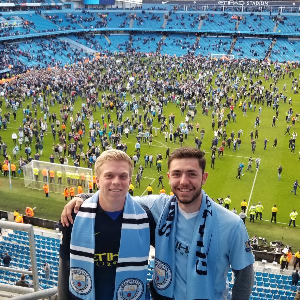 Students at a Manchester soccer game