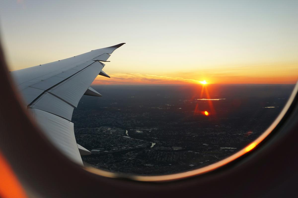 View of sunset out airplane window