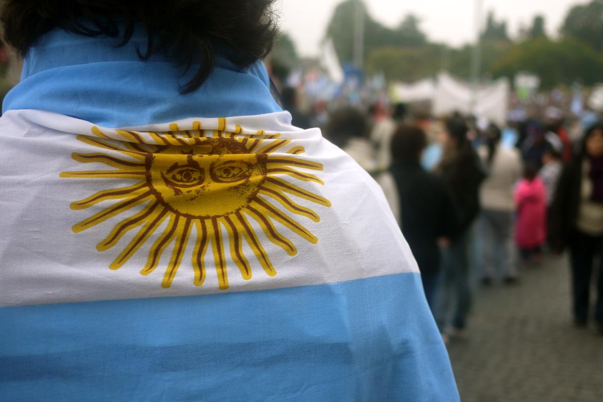 Person draped in Argentinian flag