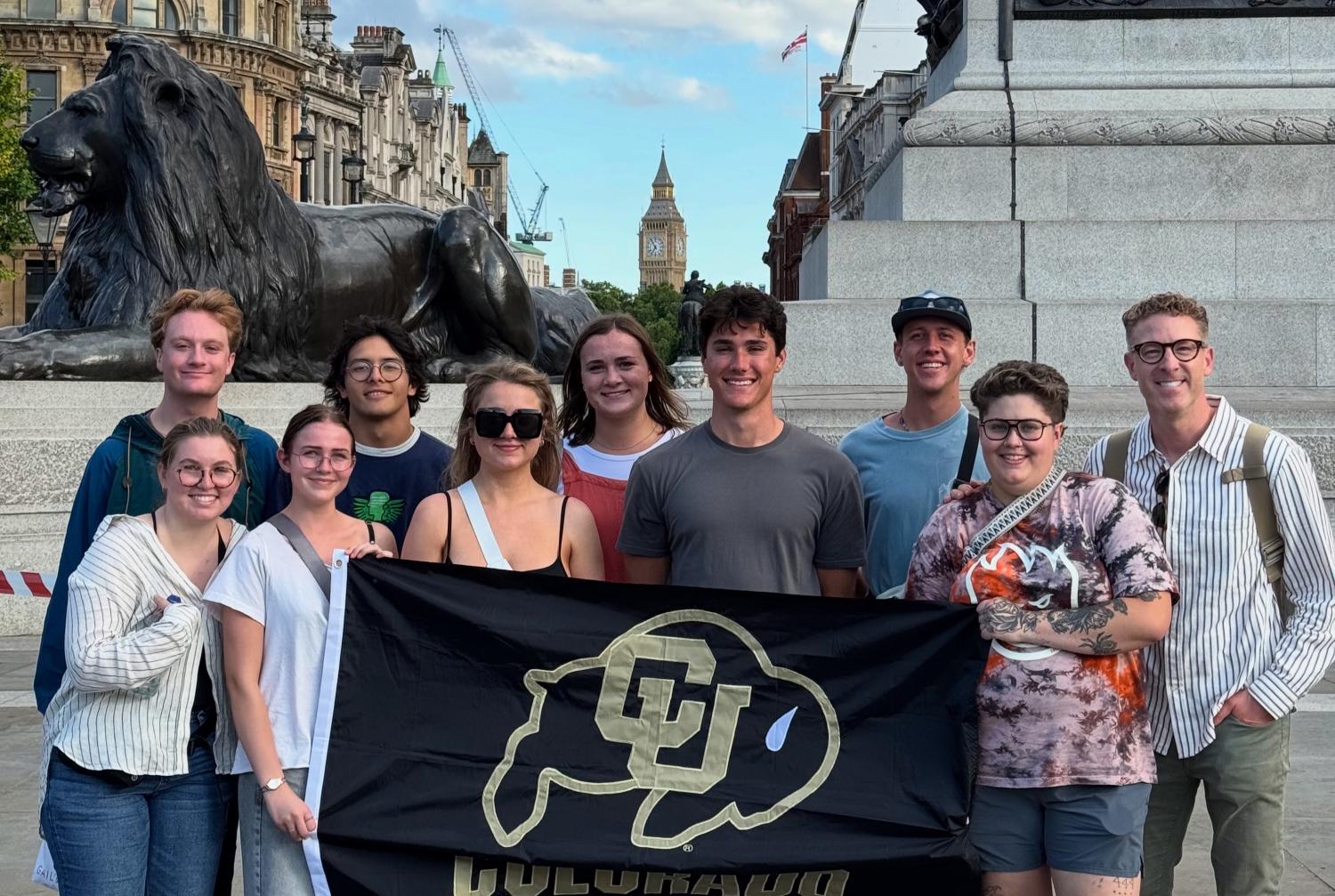 Students with CU flag in Trafalgar Square
