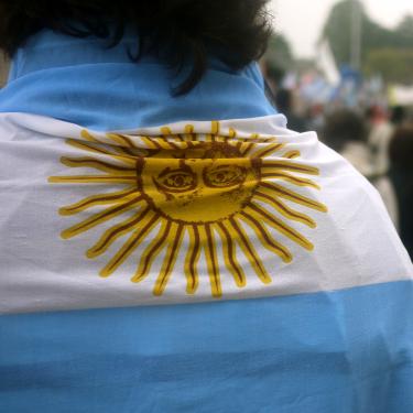 Person draped in Argentinian flag