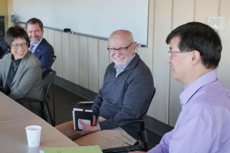 Provost Moore with other officials during a Department of Defense visit in April 2023