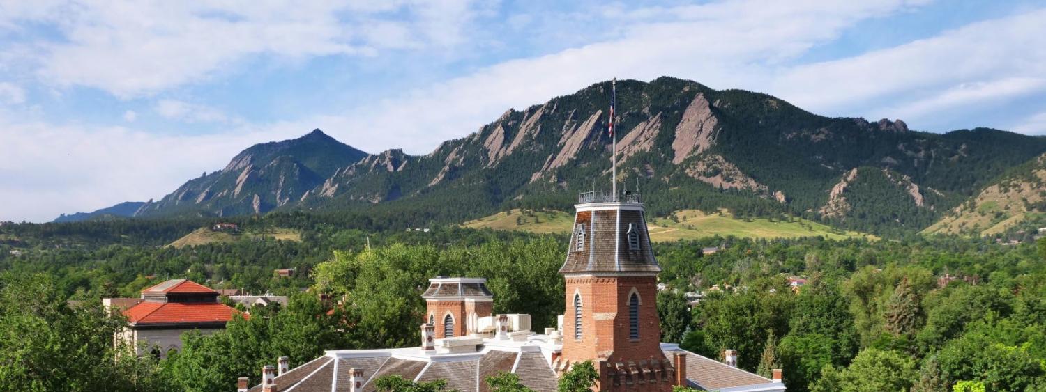 Old main and Flatirons