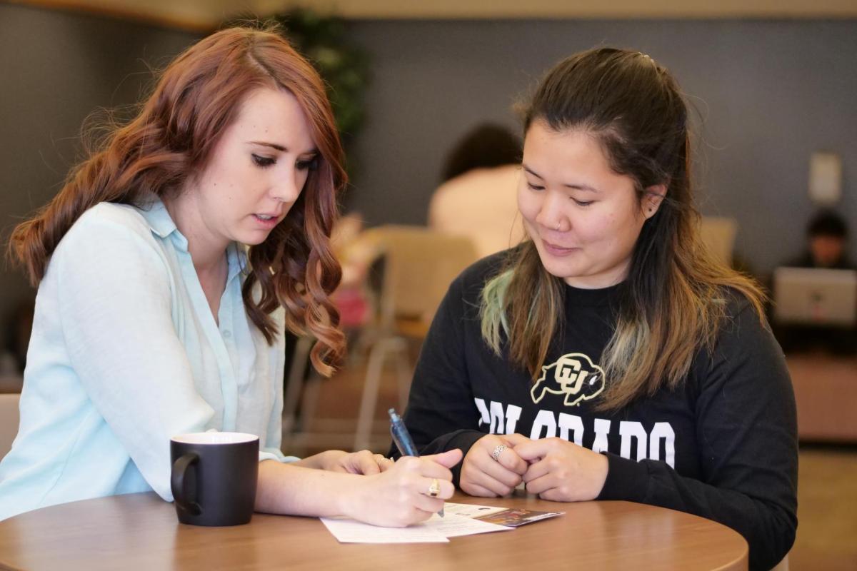 An academic advisor helping a student