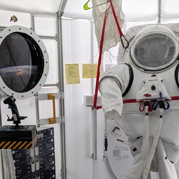 Spacesuit simulator and airlock in the Bioastronautics high bay in the Aerospace Building.