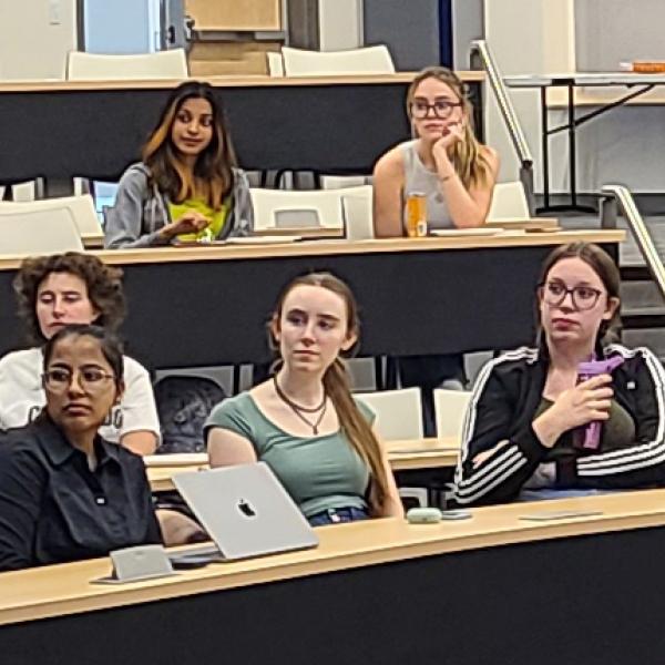 Six students in a classroom.