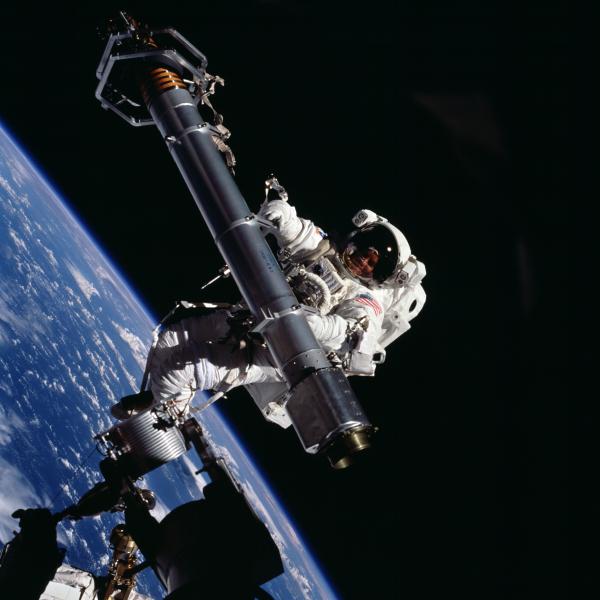 Voss conducting a spacewalk on STS-101.