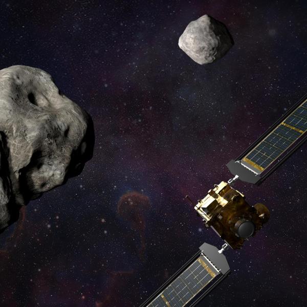 Illustration of NASA’s DART spacecraft and the Italian Space Agency’s (ASI) LICIACube prior to impact at the Didymos binary system.