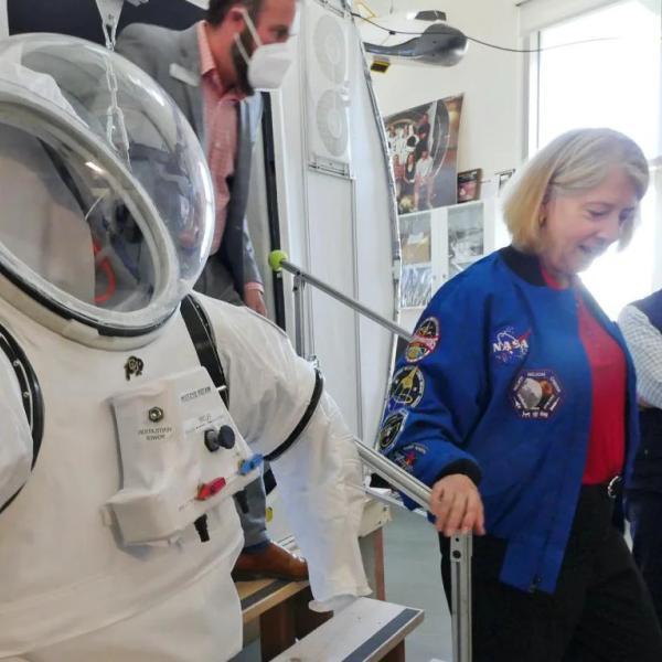 NASA's Pam Melroy tours an aerospace engineering lab on the CU Boulder campus.