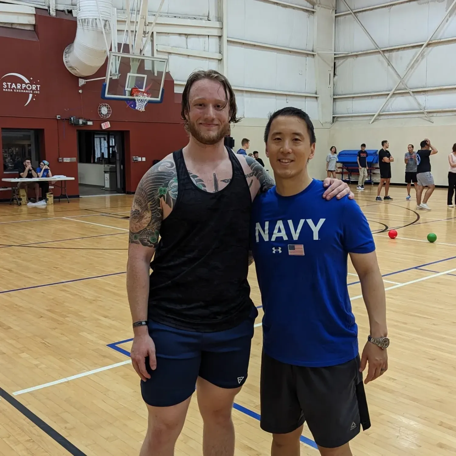 Storm playing basketball with astronaut Johnny Kim.