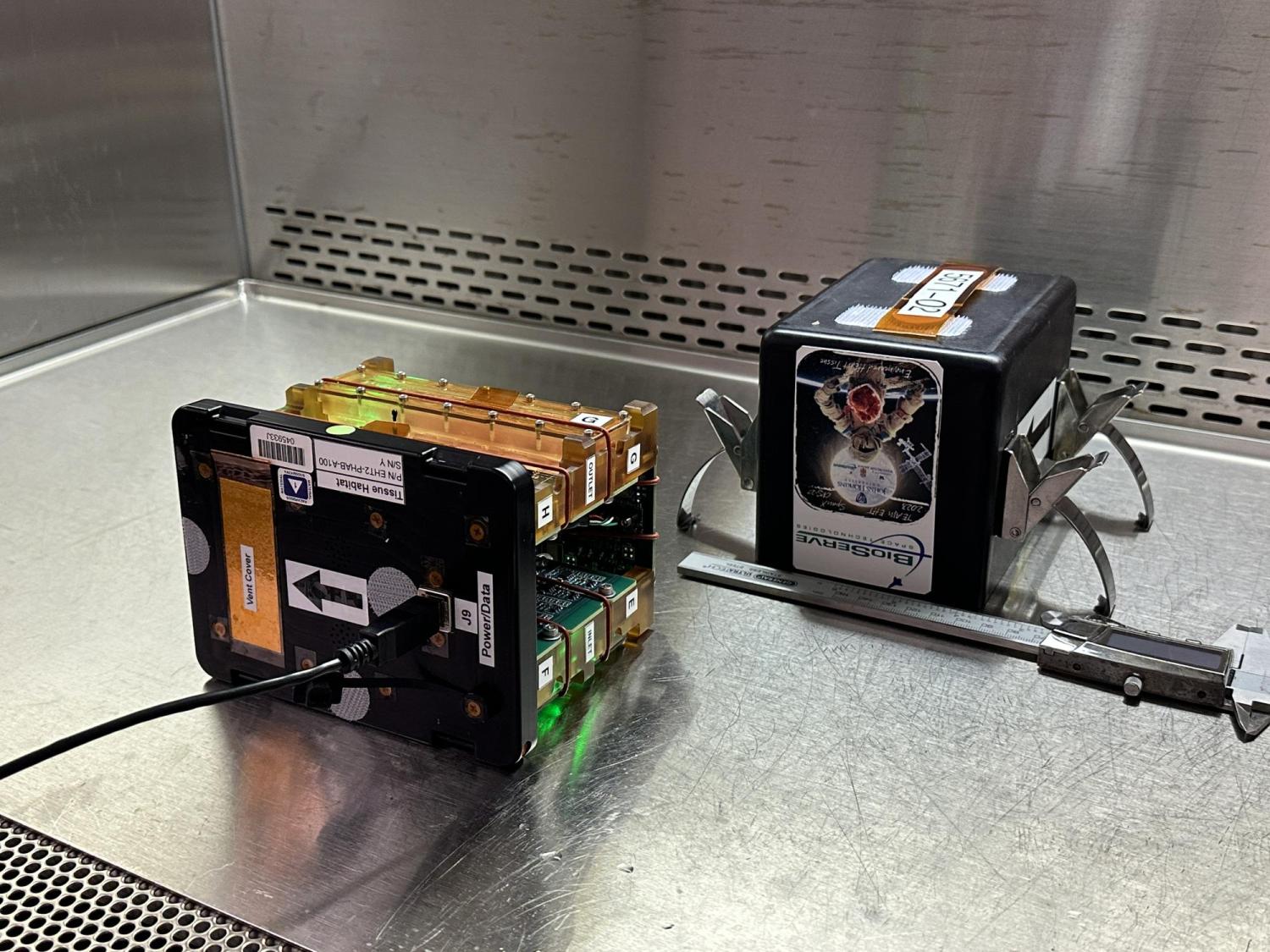 One of the experiments and its enclosure before launch here on Earth.