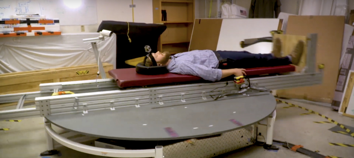 Prof. Torin Clark demonstrates the human test centrifuge