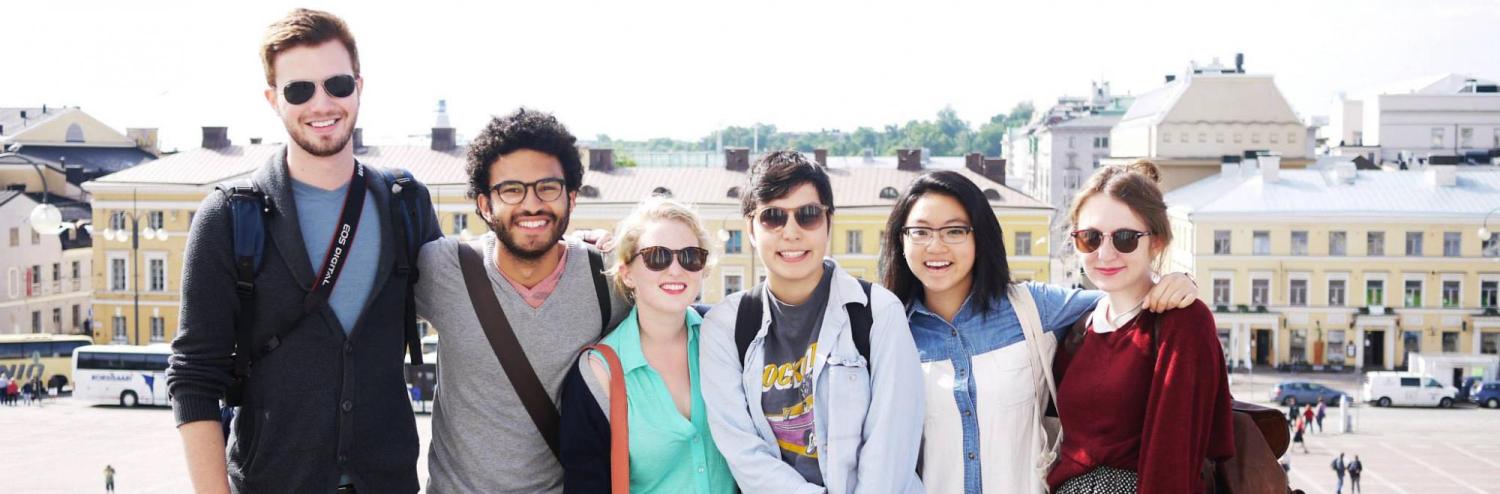 CU Boulder students pose on street in Sweden during study abroad