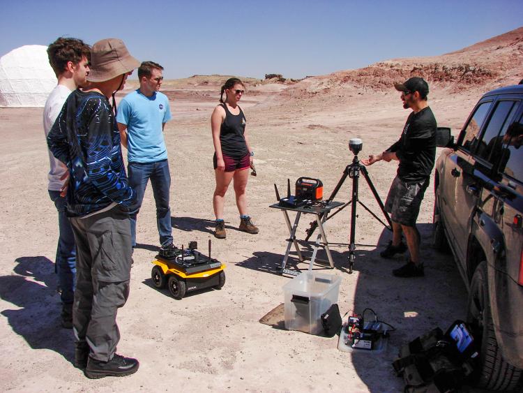 Conlon demonstrating the robot prior to the mission beginning.