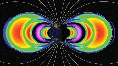 Drawing of radiation belts around Earth.
