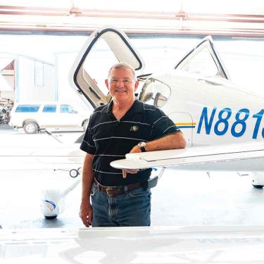 Jim Voss with his plane.