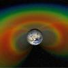 An artist’s concept of the Van Allen belts with a cutaway section of the giant donuts of radiation that surround Earth.