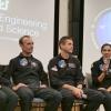 CU Boulder aerospace engineers Torin Clark, left, and Allie Hayman, right, sit with the crew of Polaris Dawn during an event on campus in 2022.