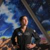 Sarah Gillis in front of a space mural.