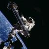 Voss conducting a spacewalk on STS-101.