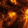 A solar flare erupts from the sun in October 2014. (Credit: NASA/SDO)