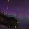 A lidar beam shooting into the sky at night.