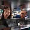 Professor Tim Minton and a student in the Molecular Beam Lab.