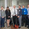 A group of senior design students standing together.