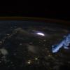 Lightning strikes the Earth viewed from space.