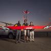 Brian Argrow with two students and a large UAV.