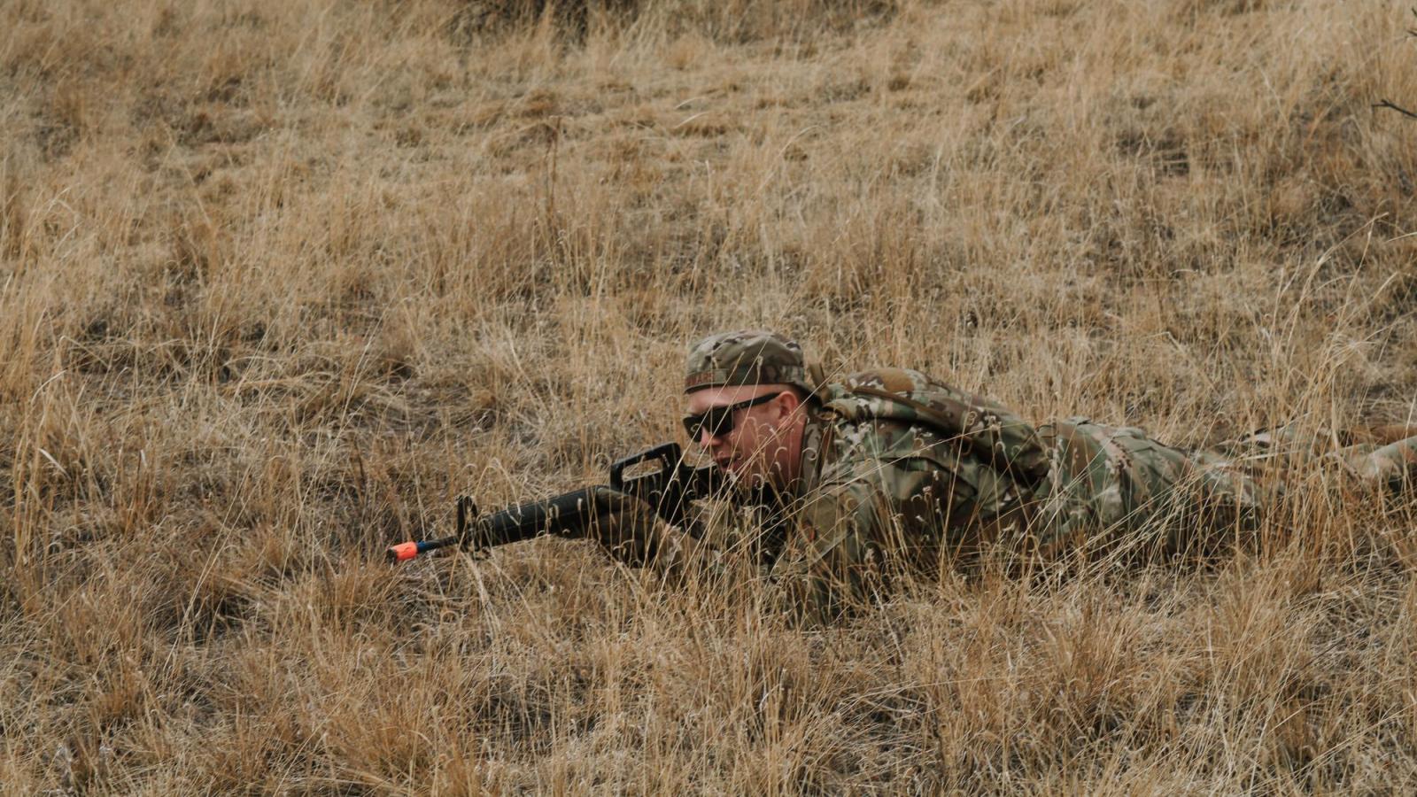 Cadet lying down with gun