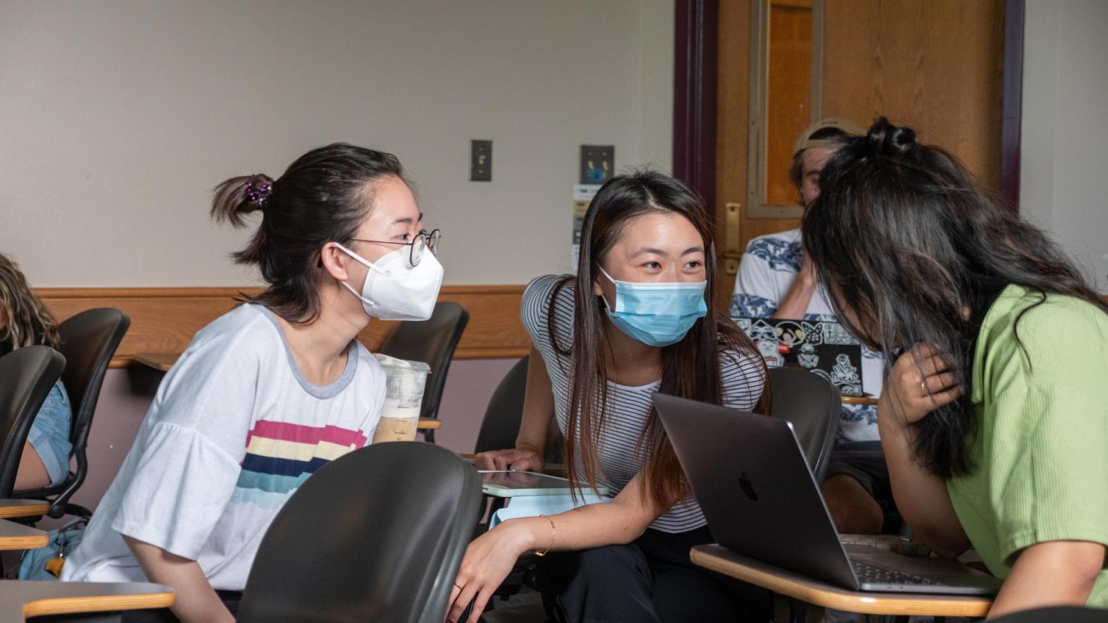 Three female students discussing