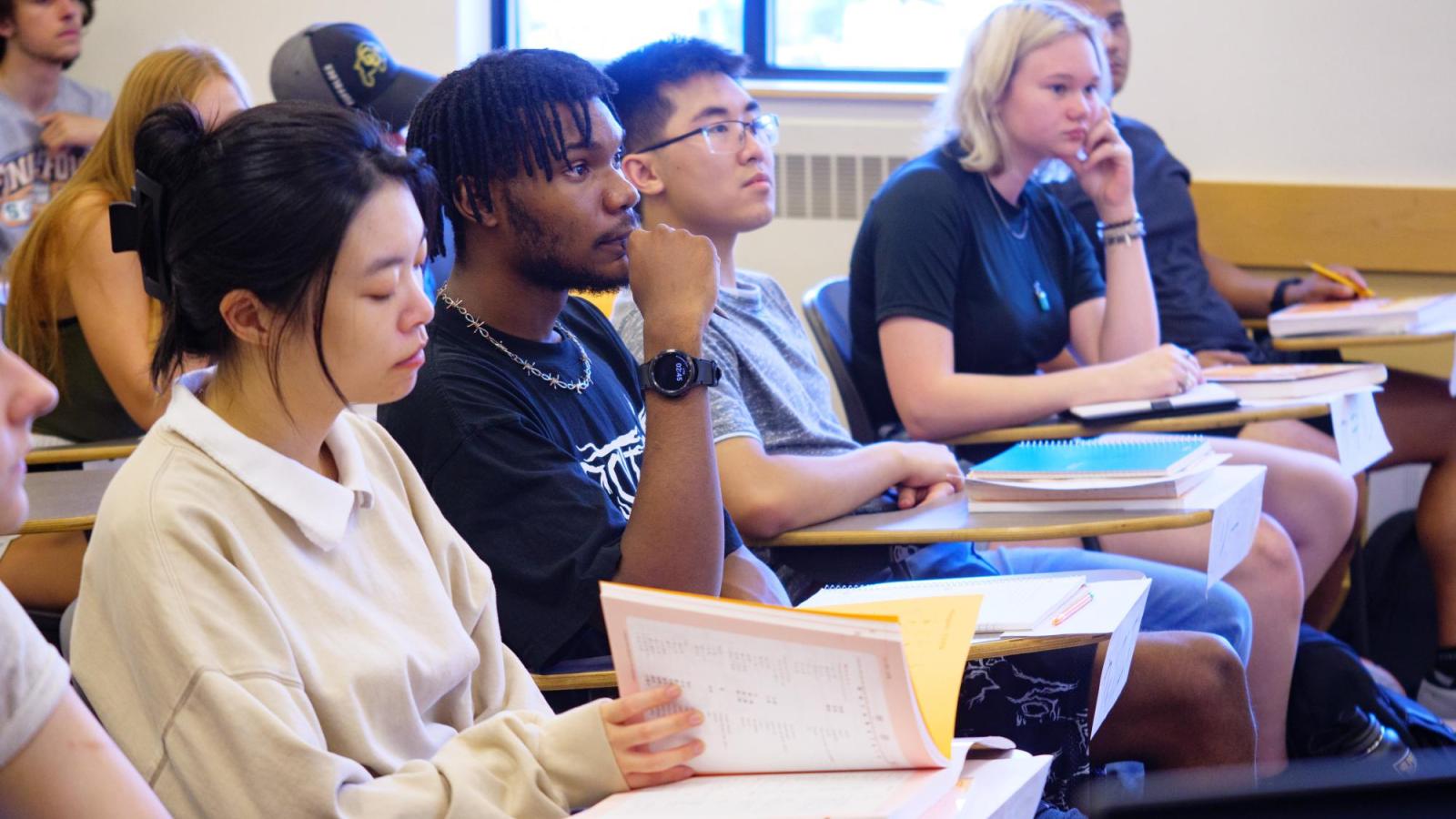 Students listening to the instructor's instructions