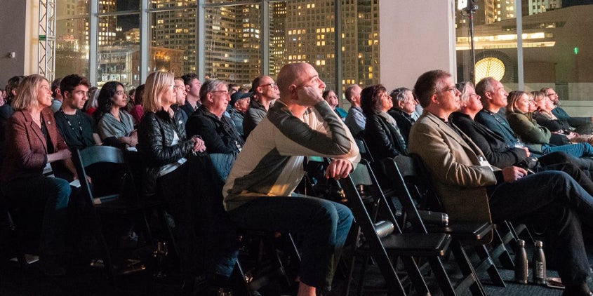 attentive audience at an academic panel 