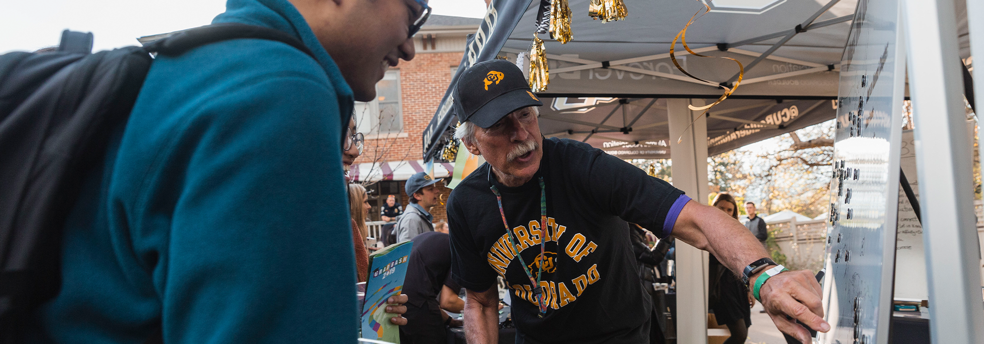 Volunteers helping students at an event