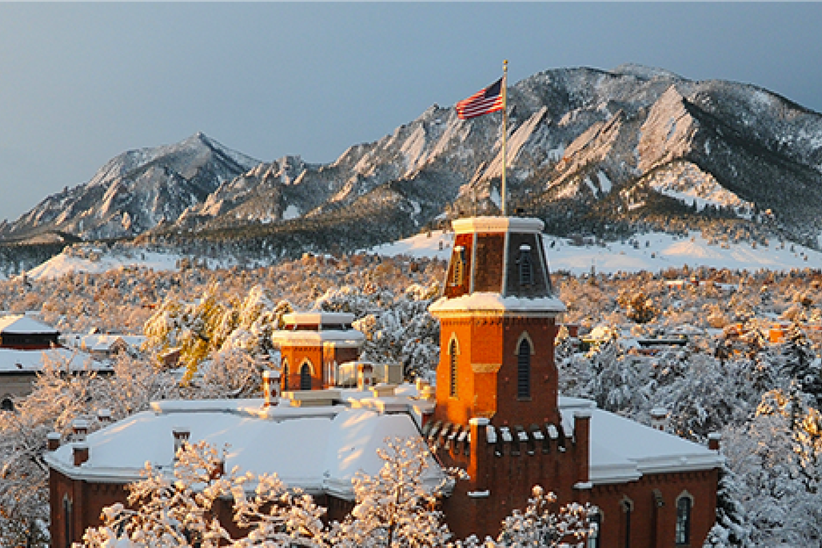 Old Main in a dusting of snow.