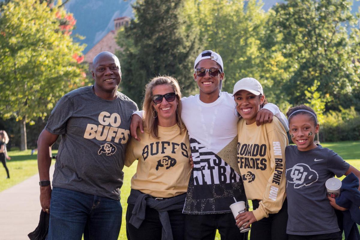A multi-generational family in CU Boulder gear