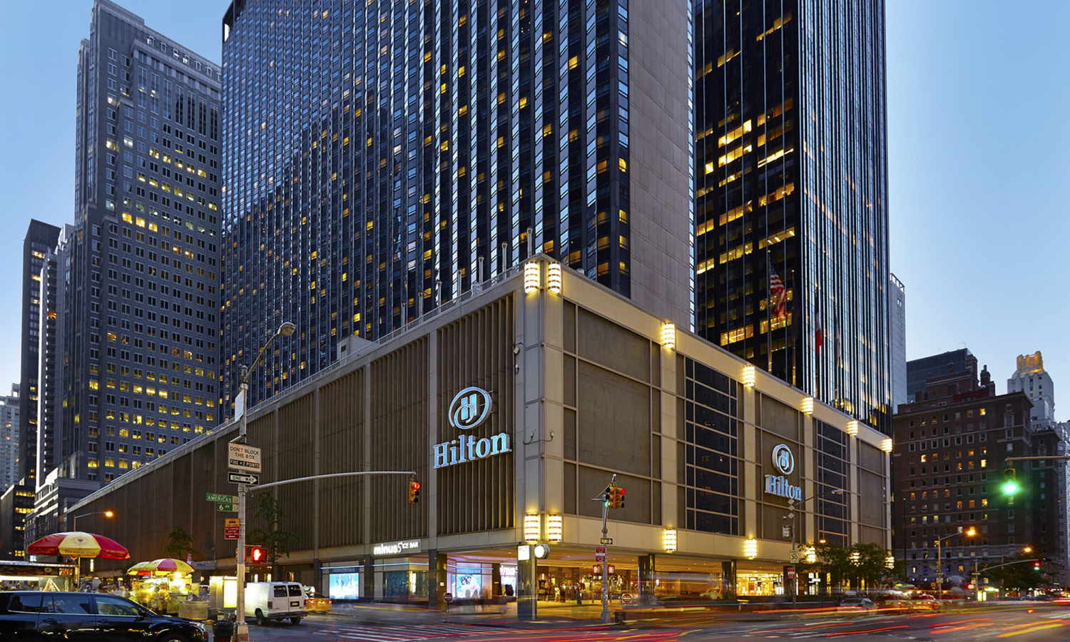 Exterior photograph of the Hilton hotel in Manhattan, New York