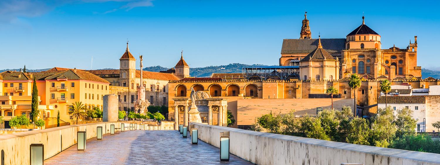 Cordoba, Spain, Andalusia. Roman Bridge on Guadalquivir river and The Great Mosque (Mezquita Cathedral)