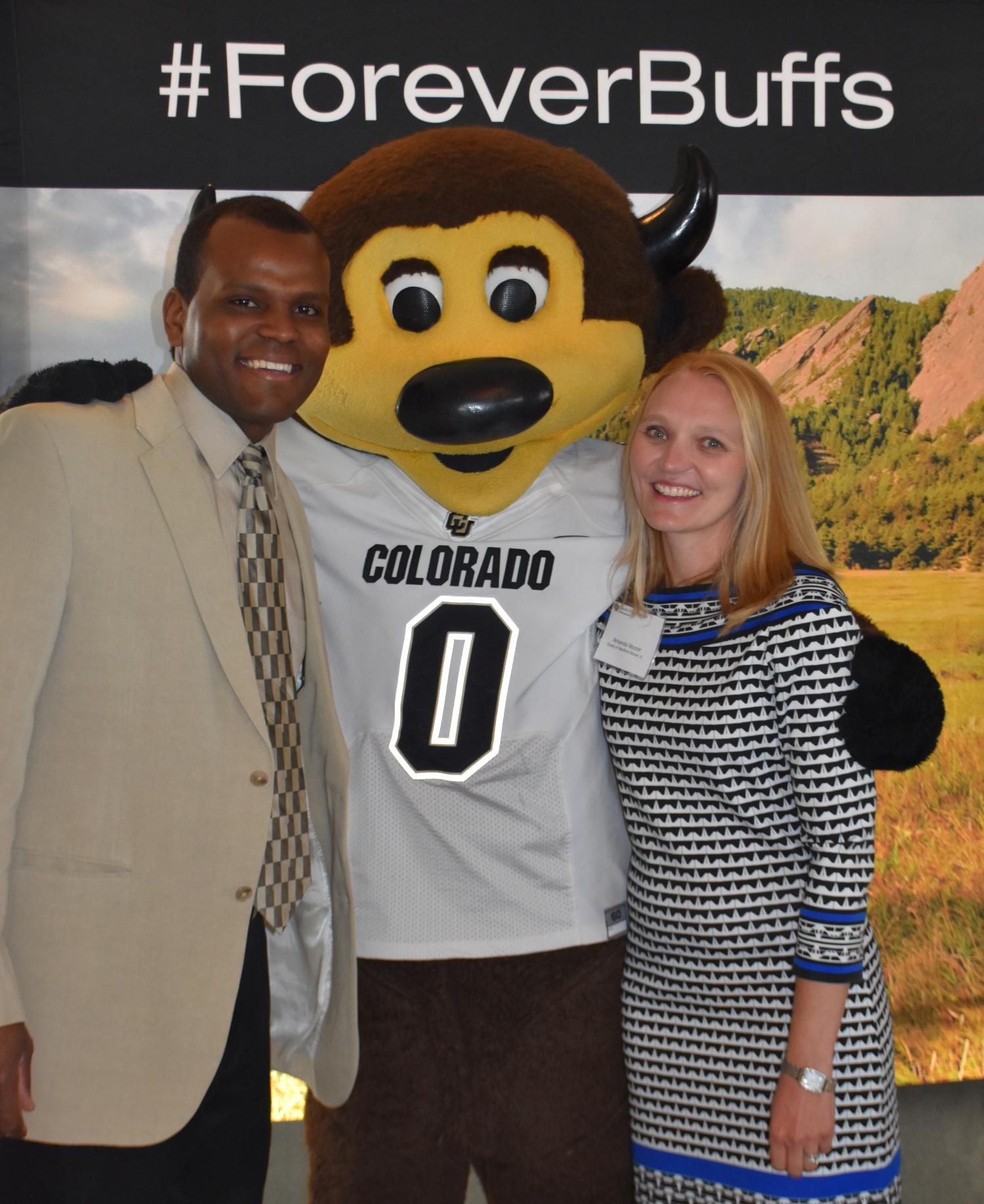Board members celebrate their CU spirit with Chip!
