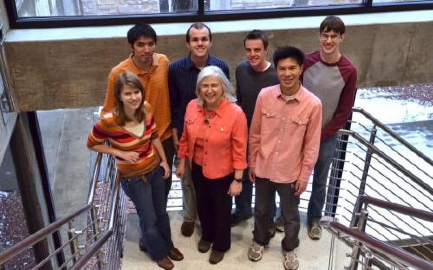 students posing with instructor