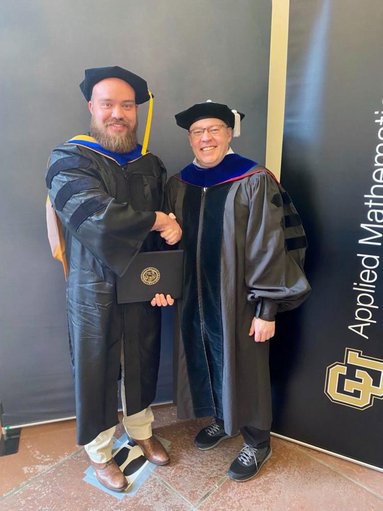 Dr. Evan Gorman with Dr. Lladser