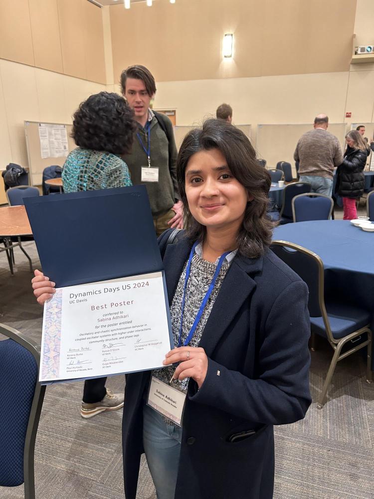 Sabina with the Best Poster award