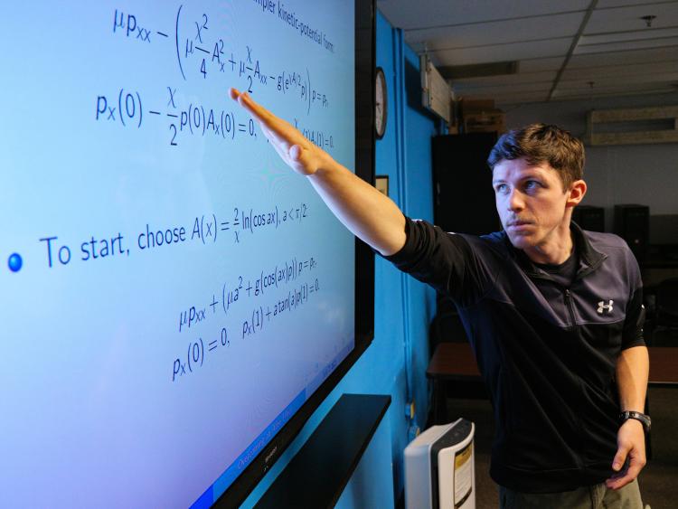 Professor teaching Applied Math class