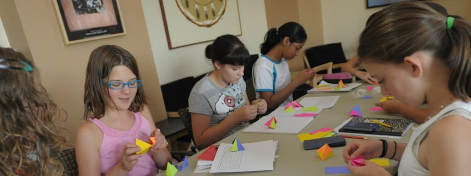 Participants in the Colorado Math Circle engage in a hands-on math learning activity. (Photo credit: Silva Chang)
